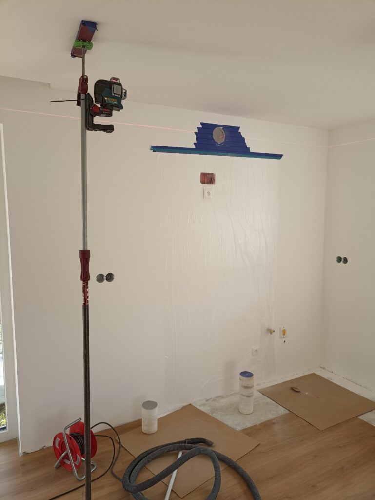 Pripravená miestnosť pred jadrovým vŕtaním: laser, ochranná fólia a odsávanie